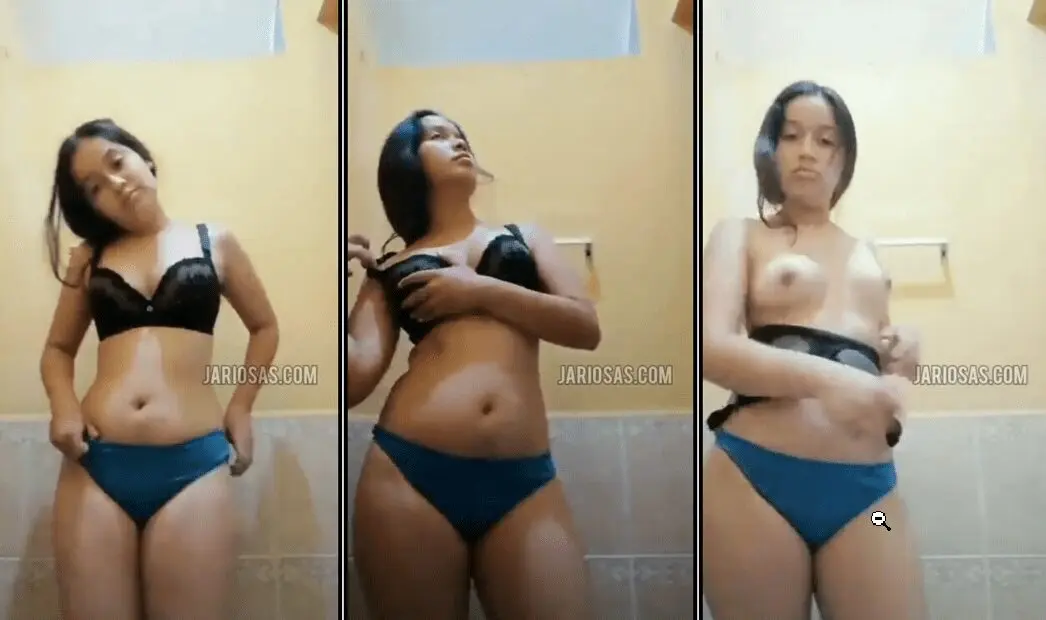la jovencita cachonda se quita toda la ropa hasta quedar completamente desnuda
